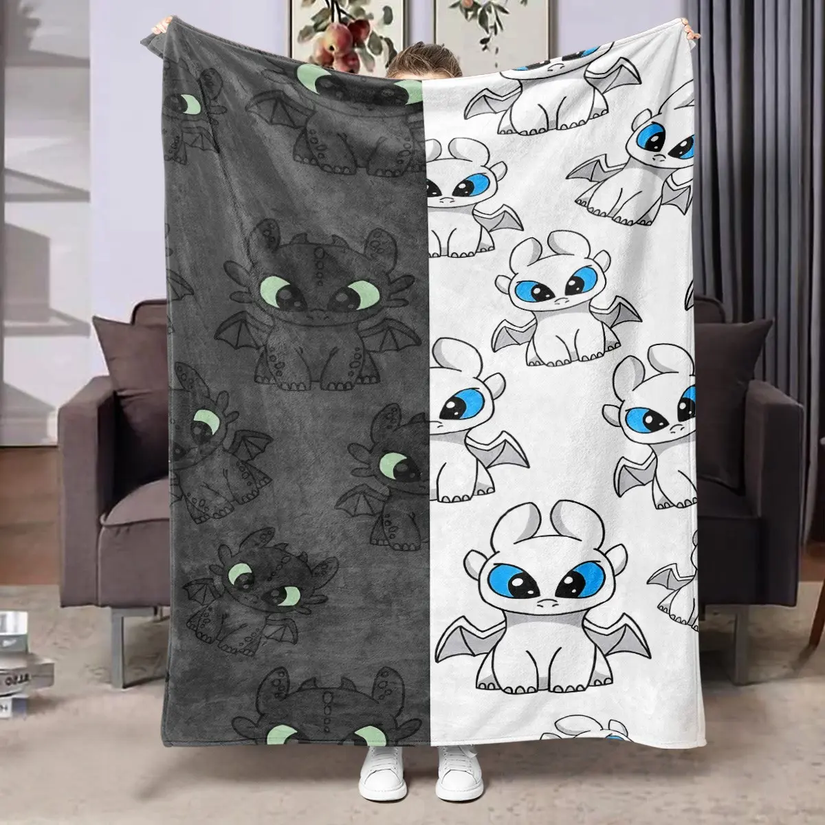 1pc Split Screen Toothless Black & White Dragon Ditsy Print Fleece Blanket, left side dark gray Night Fury Toothless, right side white Light Fury cute sitting full print pattern, simple black and white contrasting hand-drawn kid-friendly style. Soft warm