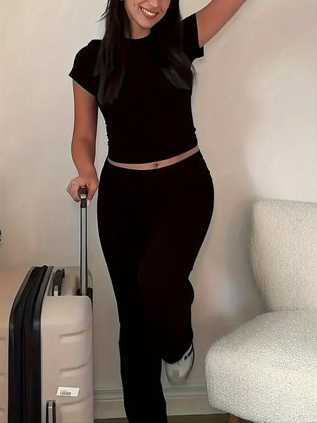 A women's round neck short sleeved top and high waisted micro flared pants solid color two-piece set, suitable for daily home commuting and going out