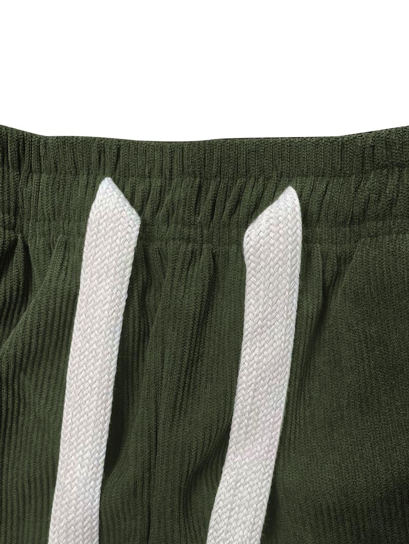 Two men's casual pants featuring a simple and versatile style with drawstring design, adding a casual feel. The pants have delicate small details, making them full of texture. The loose fit provides comfortable and relaxed wear, suitable for everyday outi