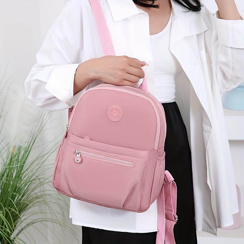 Chic Nylon Women’s Backpack – Versatile Stylish Bag with Adjustable Straps and Multiple Compartments for Work, Travel & School, Available in Gray, Purple, Black