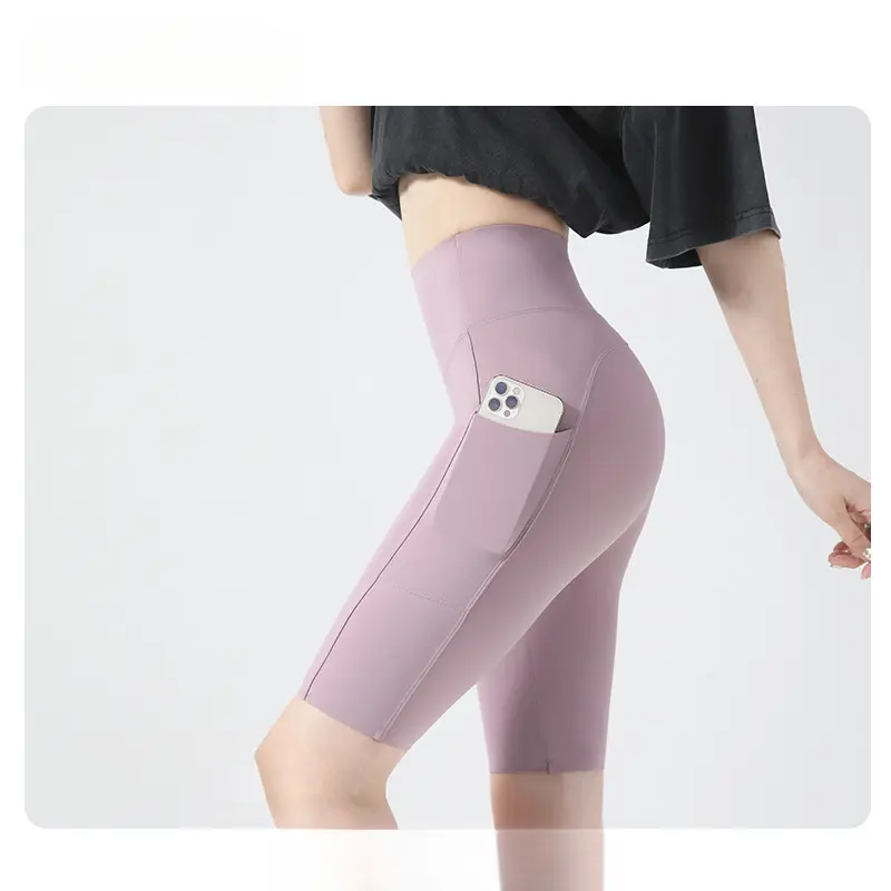 High waisted yoga shorts, soft and breathable, with pockets, elastic and tight fitting, suitable for daily exercise and casual wear, a must-have for women's outdoor leisure.