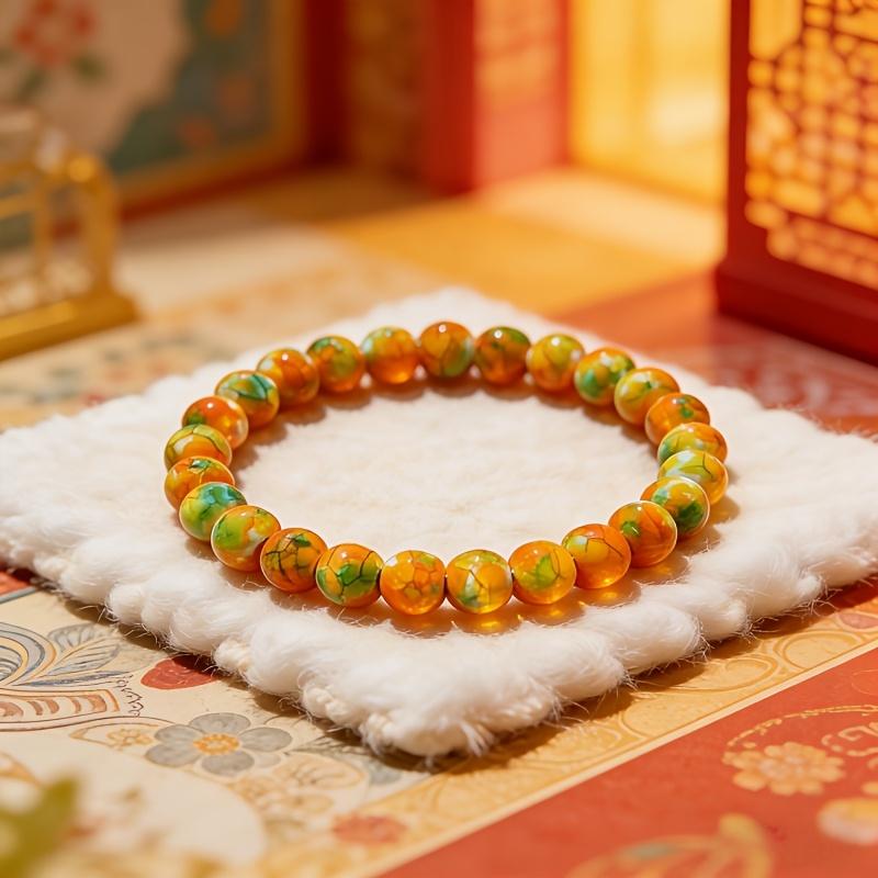 [Rain Flower Stone Bracelet] A Smooth Orange-Yellow Rain Flower Stone Bracelet That Attracts Wealth, Handcrafted And Elastic, Symbolizes Fortune And Luck, Suitable for Both Men And Women, Perfect for Everyday Wear And As a Gift