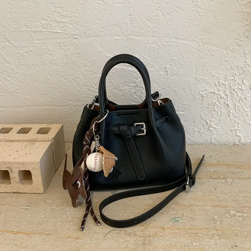 Women's 2026 Elegant Asymmetrical Solid PU Leather Bucket Crossbody Bag - Urban Simplicity Style, Ins Trendy Handbag with Baseball & Dachshund Charms, Versatile Fashion Accessory for Daily Outings, Bucket Shape