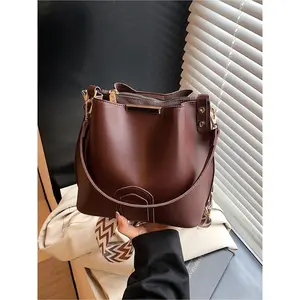 Korean-inspired bucket bag in multiple colors, Fashionable bucket bag, Soft leather design for handheld or crossbody carry commuter bag New spring/summer shoulder bag collection Handheld Bag Purse