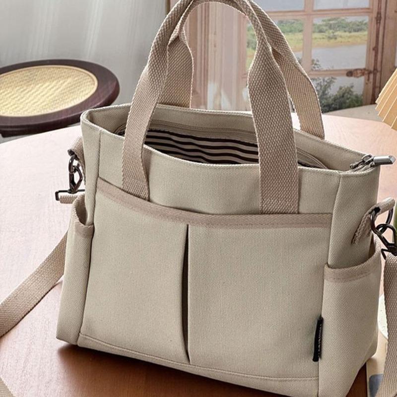 Fashionable Multi-Functional Handbag in and, Durable Polyester Shoulder and Crossbody Bag, Perfect for Commuting, Travel and Gifting