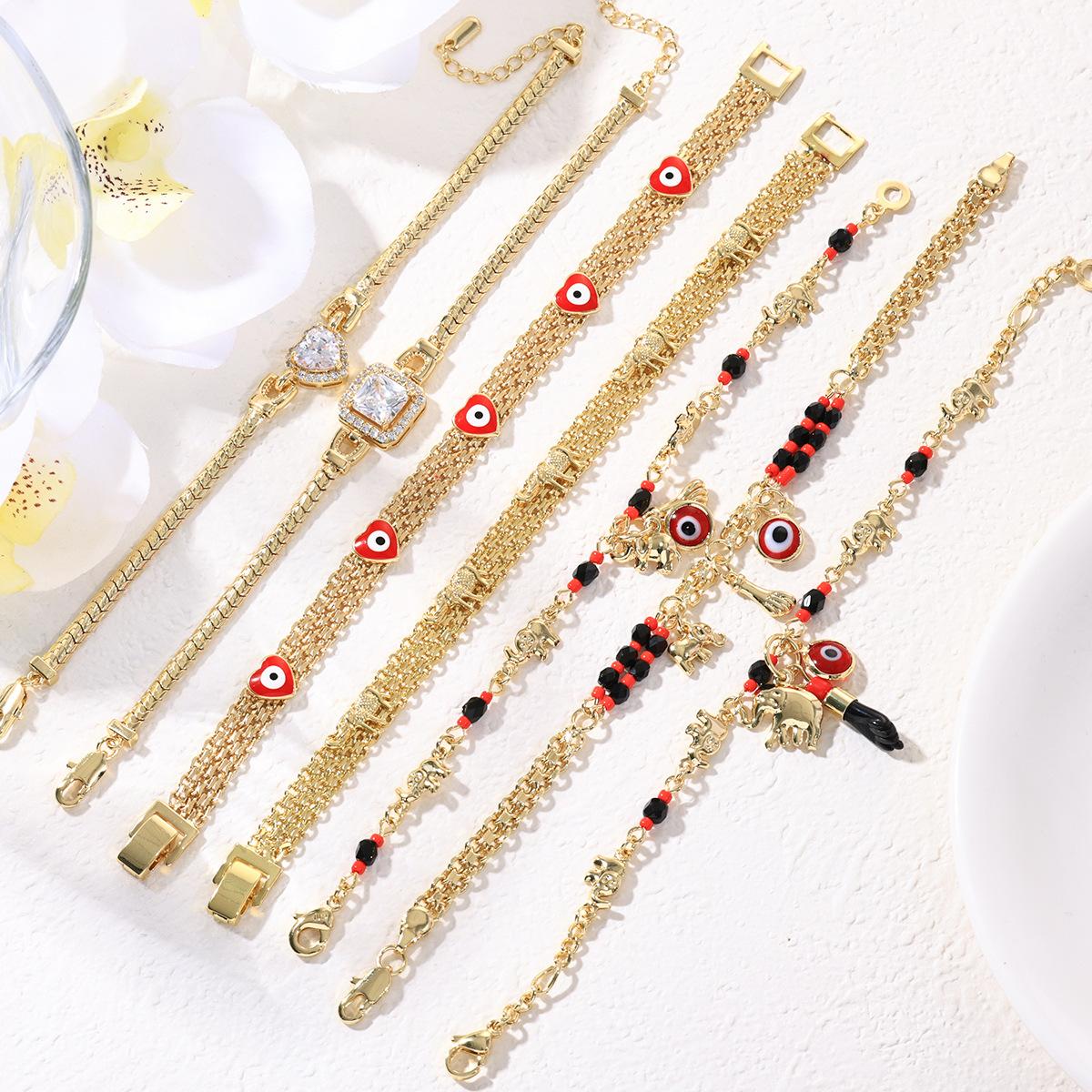Boho Red & Black Beaded Elephant Charm Bracelet, Gold Plated Copper Evil Eye Symbol & Elephant Pendant, Perfect for Parties, Music Festivals & Year-Round Wear, Ideal Bohemian Gift for Her
