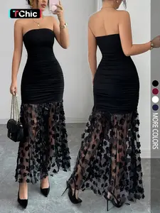 A luxurious and elegant strapless three-dimensional floral patchwork mesh sheer see-through pleated waist slimming evening gown, perfect for formal wear. A sexy solid color women's dress.