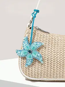Minimally casual style niche design starfish shaped pendant, gentle and artistic style fashionable and personalized pendant, can be used as a bag hanger and keychain, suitable for carrying on beach vacations and daily commuting