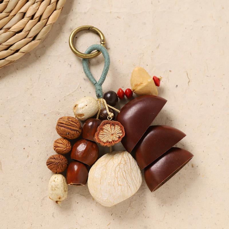Naturally handcrafted fruit shell bell, with seeds, sound therapy handbell, wish-fulfilling fruit bag ornament, Yunnan specialty gift, mobile phone decoration accessory