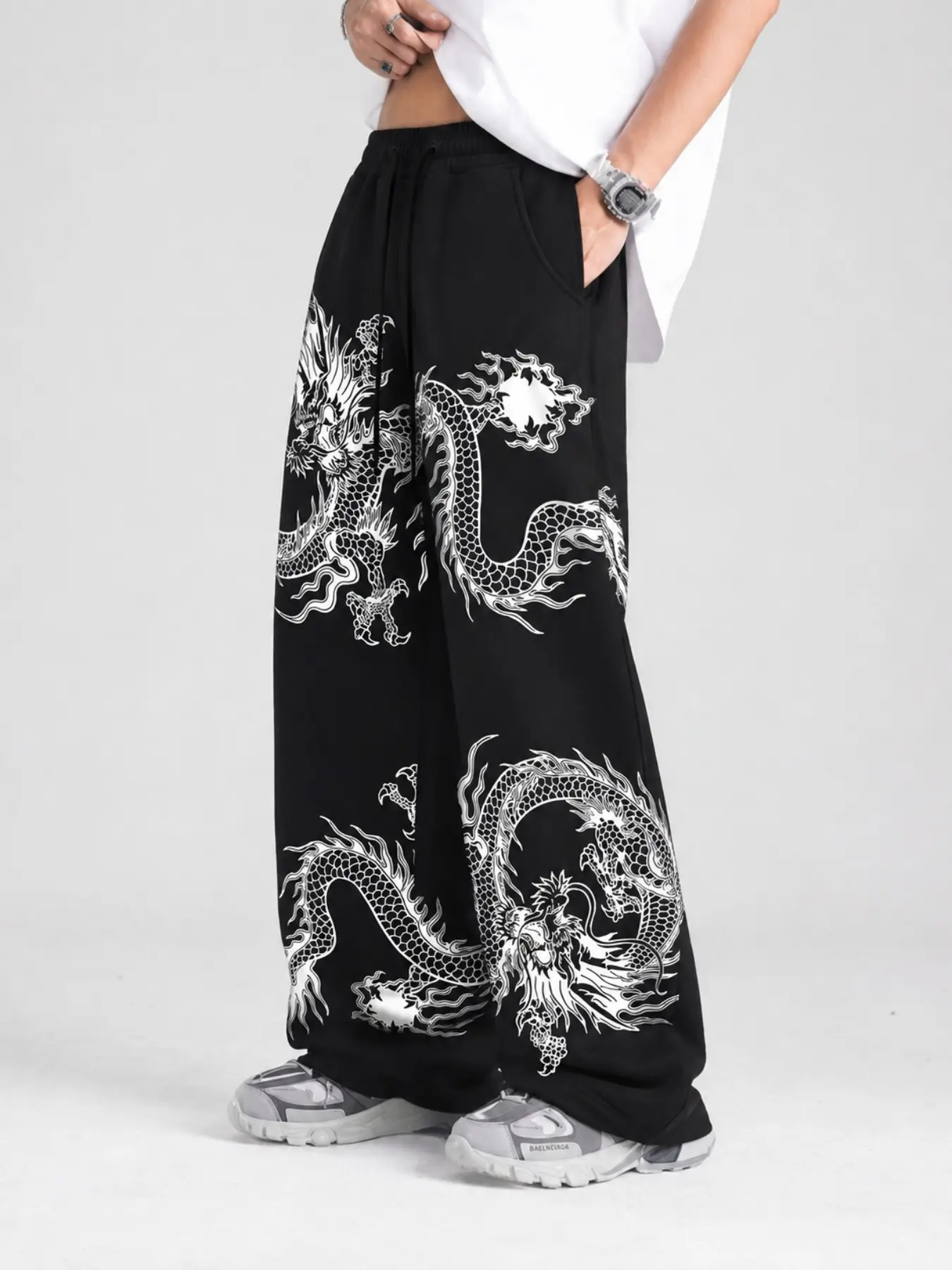 Men's Black Dragon Graphic Sweatpants, Baggy Wide-Leg Drawstring Pants with White Eastern Dragon Prints and Small Letter Details, Retro Y2K Streetwear Joggers for Campus Looks, Skate Outfits, Travel, Music Festivals, Parties, Photos, and Casual Wear
