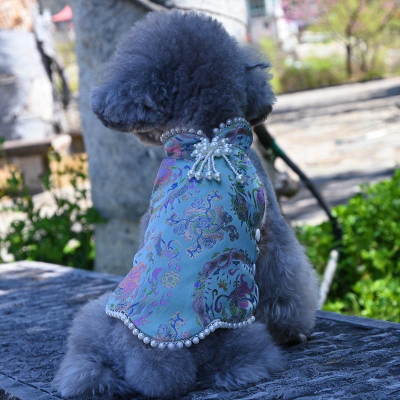 Paws Trendy Pet Spring & Summer Qipao for Dogs & Cats, suitable for Teddy, Bichon Frise and other small dogs. Features embossed fabric with exquisite retro frog buttons, fine workmanship, exuding noble elegance and making your beloved pet stand out.