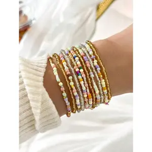202611 Bohemian Style Colorful Crystal Glass Rice Bead Handmade Bead Elastic Bracelet Fashionable and Simple Women's Party Vacation Personalized Multi-layer Stacked Bracelet Set