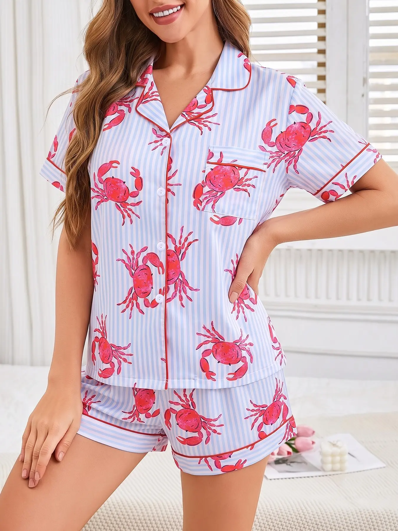 Women's 2-piece pajama set, light blue and white vertical stripes with hand-drawn red crab full print, fresh ocean vacation style. Red piping lapel top with pocket, elastic waist shorts, soft comfy casual women loungewear for all-season daily home wear