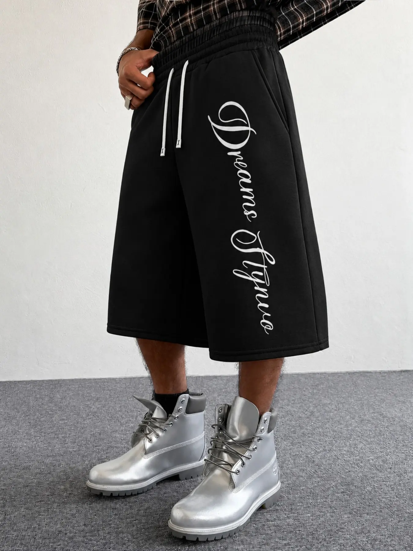 Men's Black Baggy Script Graphic Bermuda Shorts, Wide-Leg Drawstring Shorts with White Vertical Cursive Print, Y2K Hip Hop Streetwear Bottoms for Summer, Loose Casual Street, Travel, Festivals, Casual Weekends, and Daily Styling