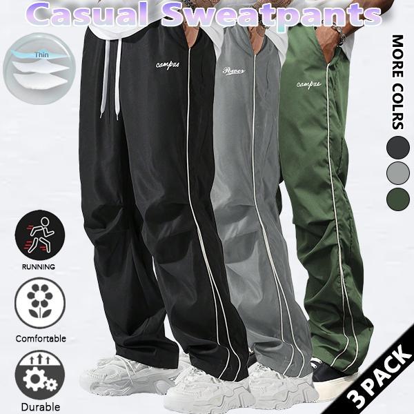 Loose-fitting sweatpants for men, grey side stripes with gold accent stripes, comfortable design, sports casual style bottoms, sweatpants, fitness wear, today's fashion outfit