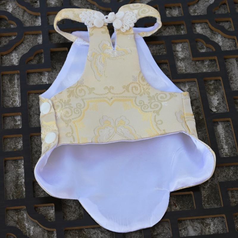 Paws Trendy Pet Spring & Summer Qipao for Dogs & Cats, suitable for Teddy, Bichon Frise and other small dogs. Features embossed fabric with exquisite retro frog buttons, fine workmanship, exuding noble elegance and making your beloved pet stand out.