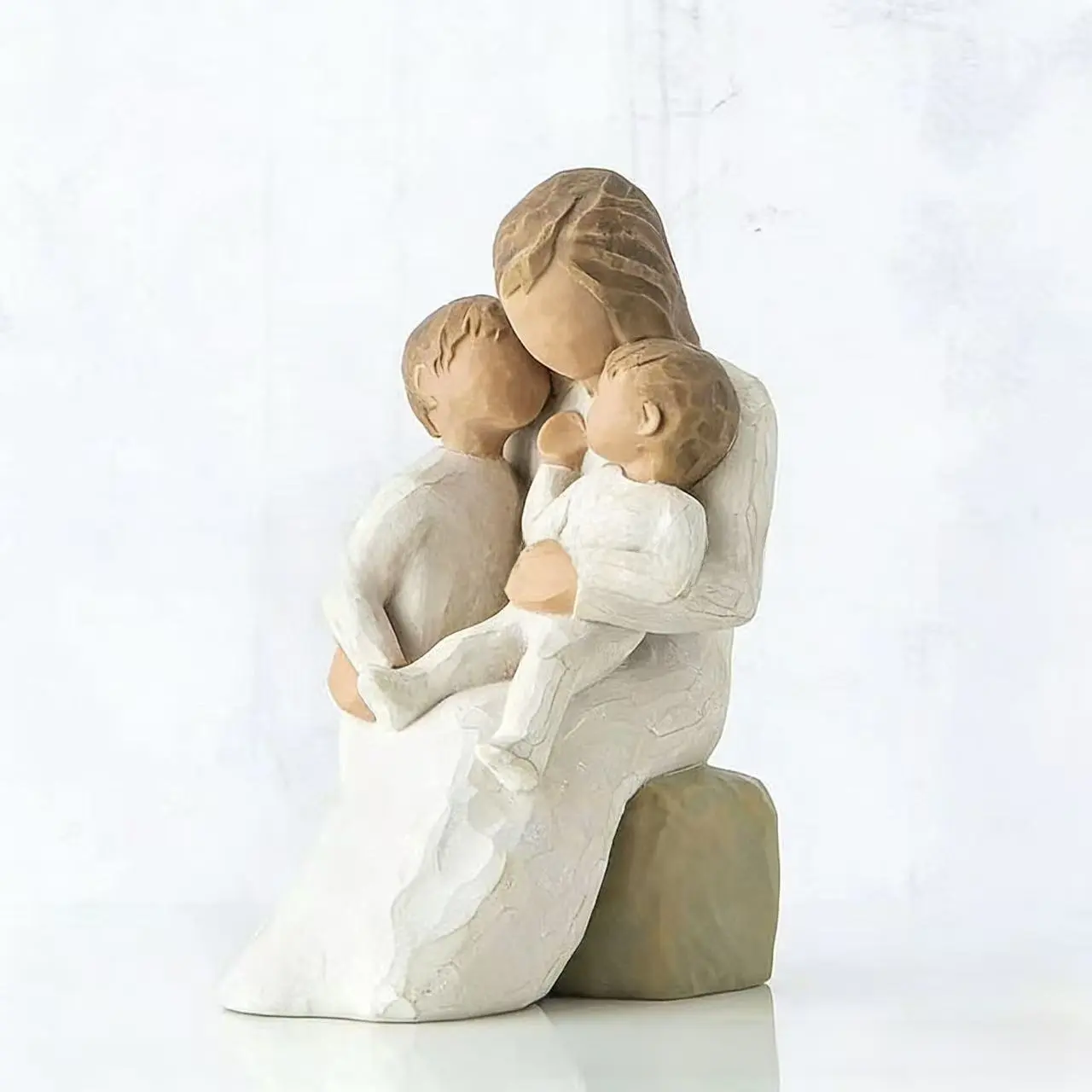 Mother holding baby (in stock)