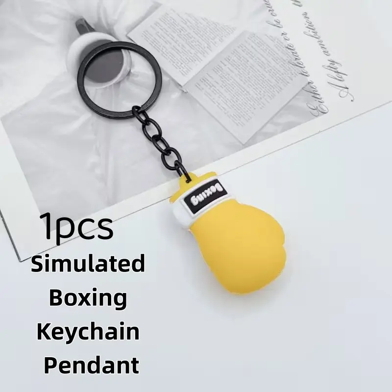 1 piece sports boxing glove silicone keychain, available in red, black or yellow. Cute mini keyring. Suitable for cars, bags and backpacks. A gift for male and female sports enthusiasts.