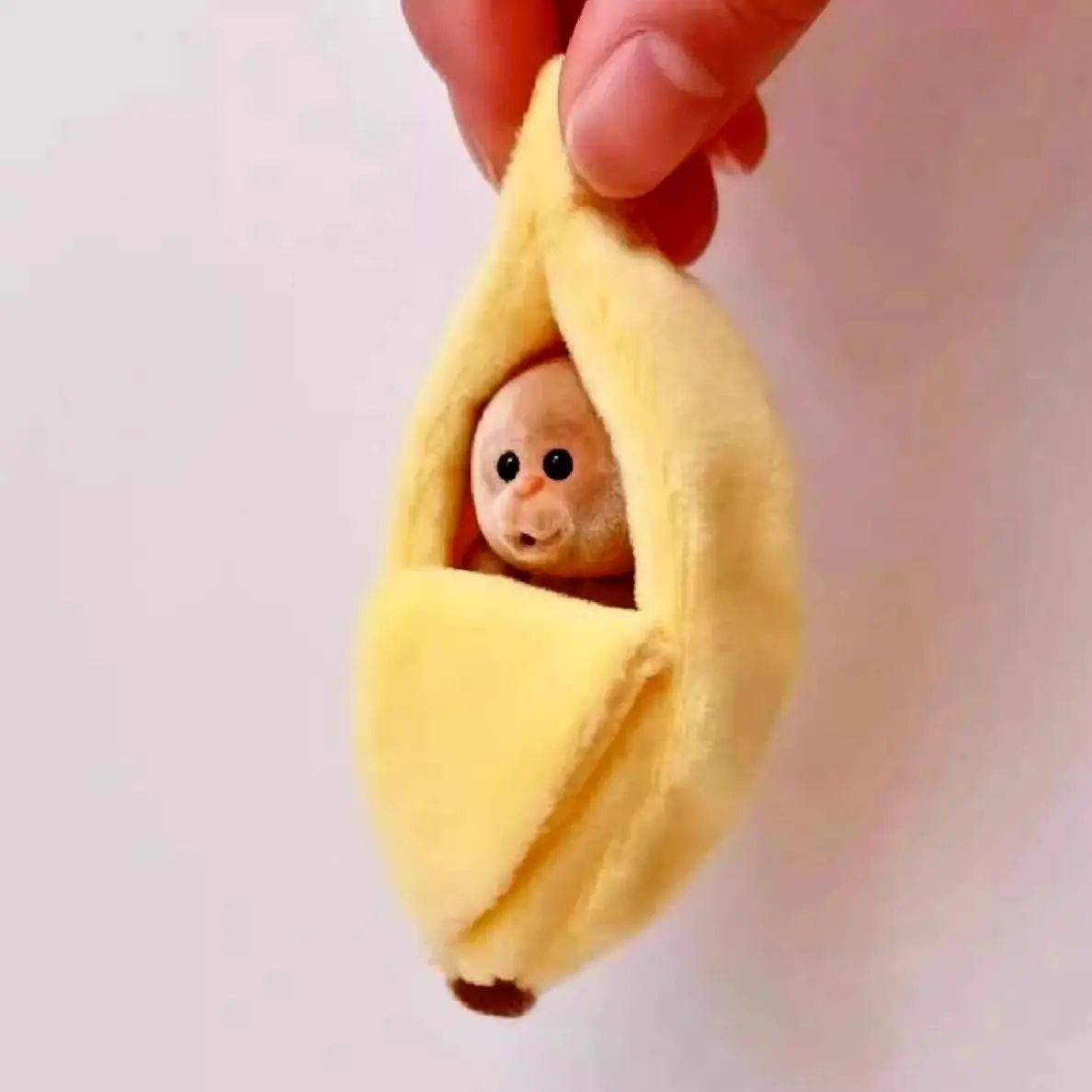 1 set Creative Little Monkey Banana Decor Accessories, a cute little monkey lying in a banana bed. Fun birthday gift, perfect for small presents to friends