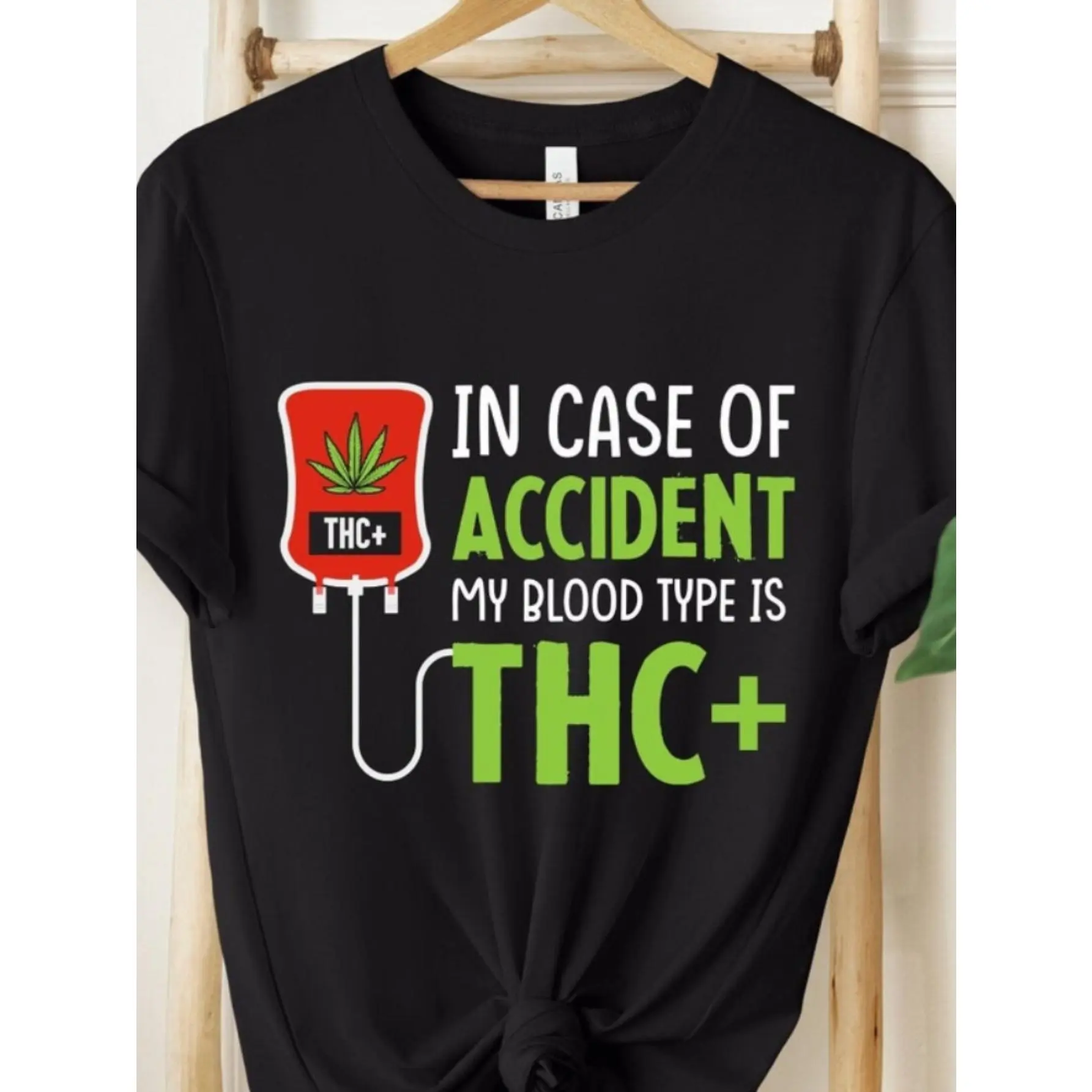 The phrase "My blood type was THC+ at the time of the accident" on this men's casual sports T-shirt makes it the perfect gift for a trendy person. It's also a unisex party T-shirt.