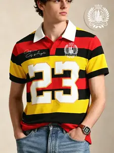 Men's 90s vintage color-block rugby polo shirt with a loose fit short-sleeve cut, featuring large printed number "23" and embroidered handwritten signature. This breathable retro sport-style polo is ideal for skate styling, daily campus wear, urban stroll