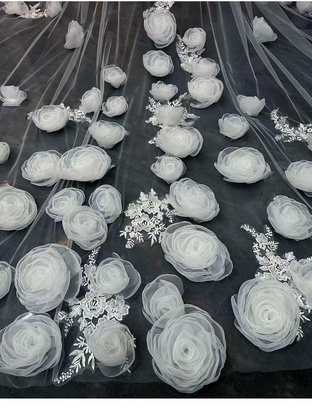 Luxury-style long veil with dreamy, elaborate floral designs and a cathedral-style train