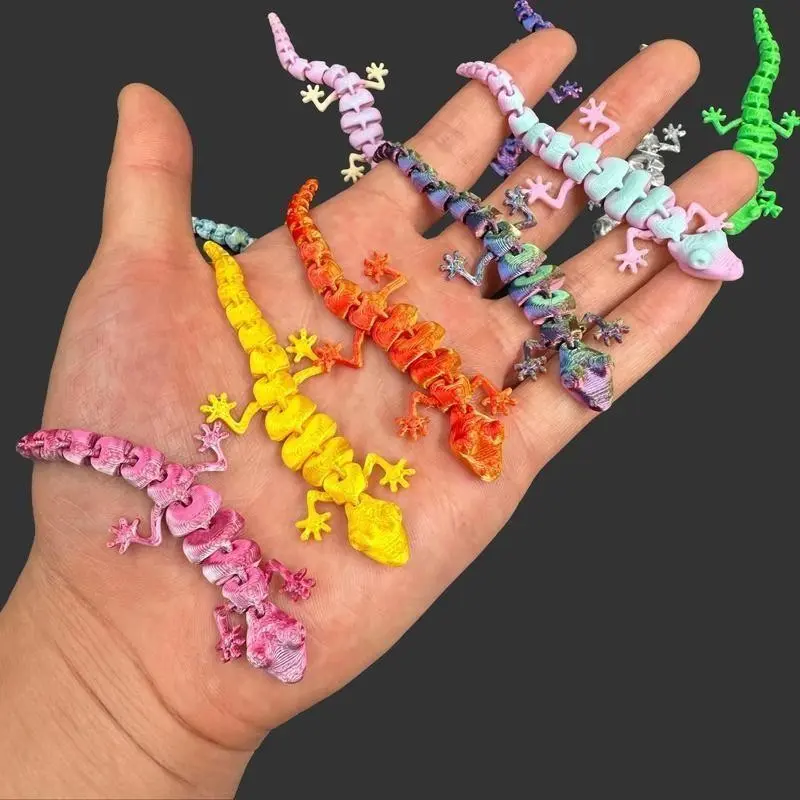 100 pieces 3D printed lizard figurines, with bright colors and smooth surfaces. Suitable for Halloween, New Year decorations, home landscaping and creative displays. Perfect for Halloween party scene setup.