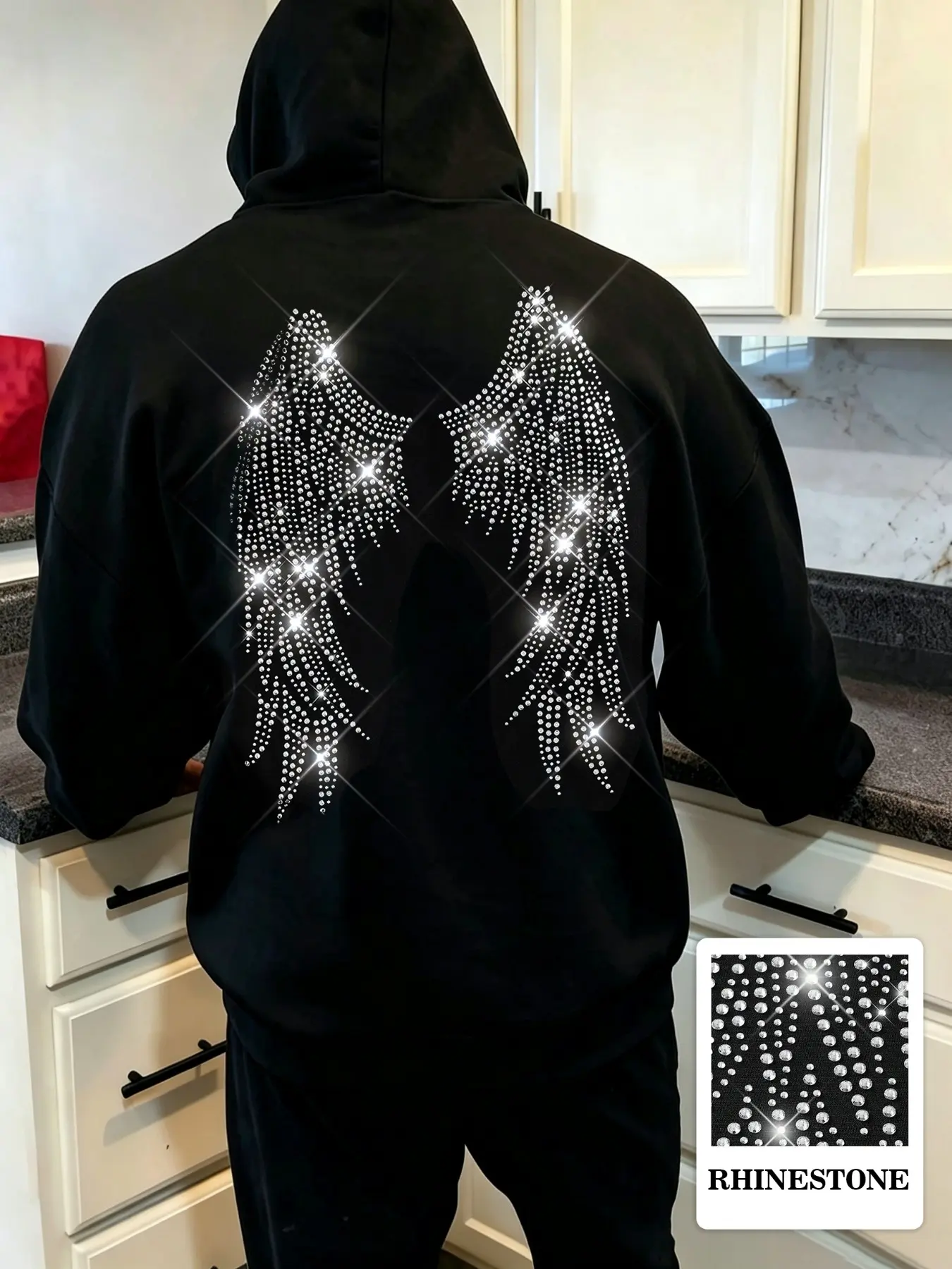 Men's hooded sweatshirt Long sleeve featuring a fleece lining for autumn and winter, a rhinestone wing design, and a distinct streetwear vibe; suitable for wearing alone or layering, it offers warmth and thickness—a versatile everyday essential.