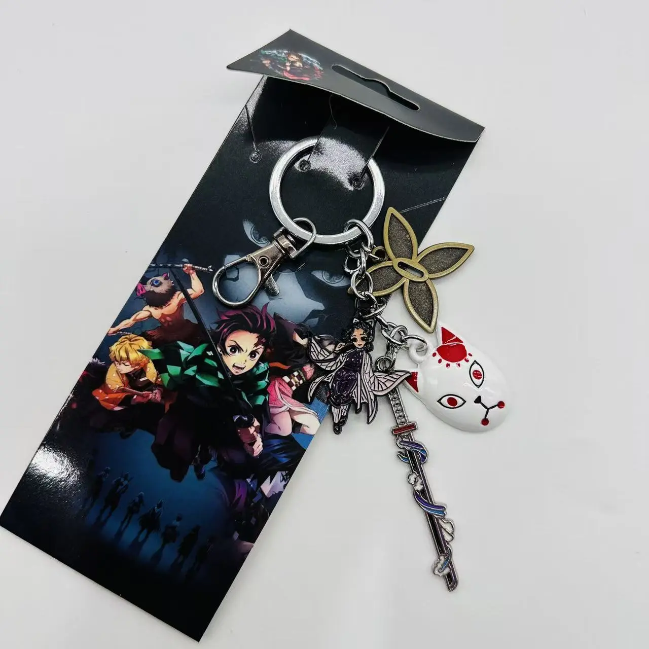 Demon Slayer Metal Alloy Multi-Charm Keychain Set - Shinobu Butterfly, Sword, Fox Mask Charms, Unisex Anime Cosplay Accessory, Kawaii Bag Attachment, Birthday Gift Ideas for Fans