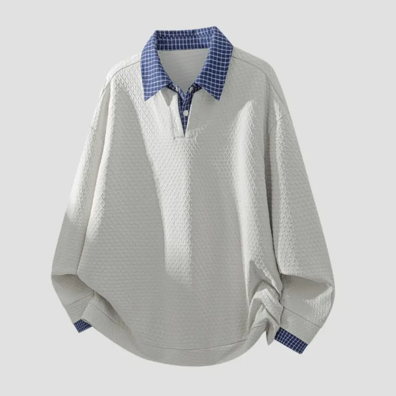 Faux two-piece long-sleeve polo shirt with checkered fabric applied on collar and cuffs, embossed textured main body, placket with single button closure, loose relaxed silhouette, suitable for daily casual styling#SummerWins