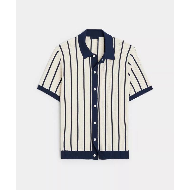 Vertical striped knit short sleeve polo shirt with contrast lapel collar and full button placket, lightweight breathable ribbed knit slim tailored silhouette retro resort top staple for sophisticated casual modern mensfashion styling