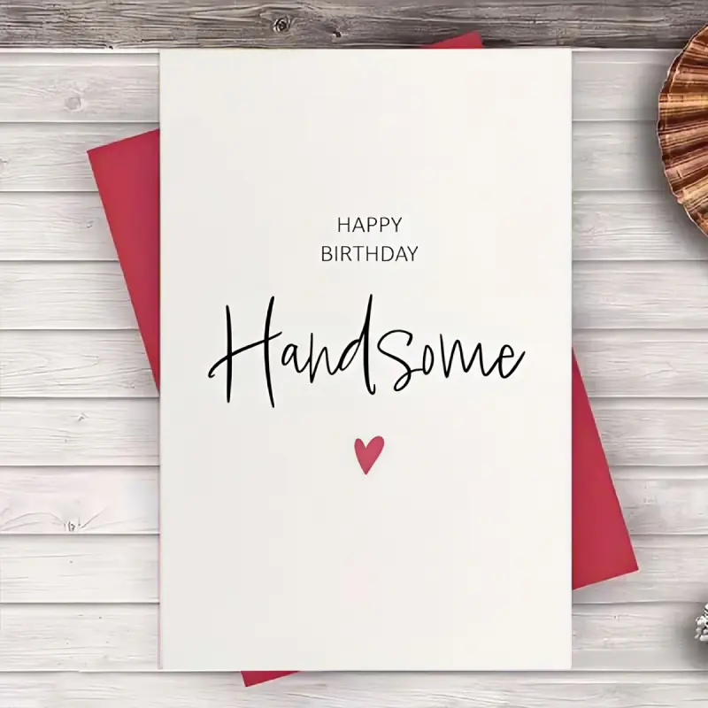A blank birthday card, Greeting card, with envelope, featuring a simple 'Happy Birthday Handsome' handwritten message with a red heart pattern, suitable for a boyfriend, husband, with sweetness and exclusive blessings