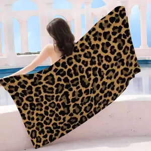 Leopard print beach swim towel. Soft, absorbent, sand-resistant, and comfortable, suitable for travel, swimming, camping, and beach use.