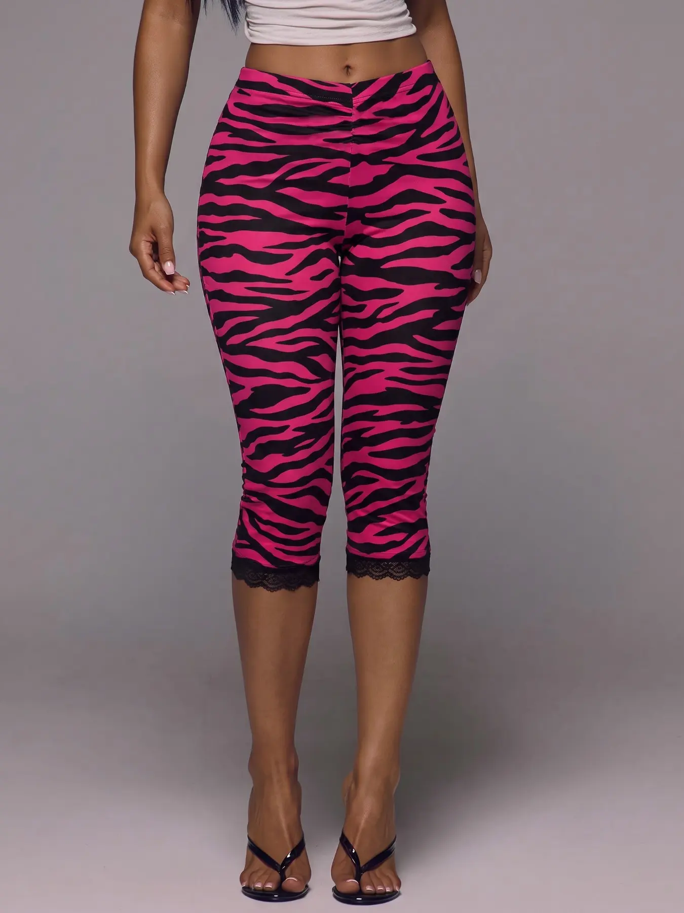 Trending Hot Pink Black Zebra Print High Waist Slim Capri Leggings Smooth Stretch Fabric Retro Animal Graphic Lace Hem Skinny Cropped Pants, Mid Calf Tight Bottoms Perfect For Daily Street Matching Short Crop Tees Outfits