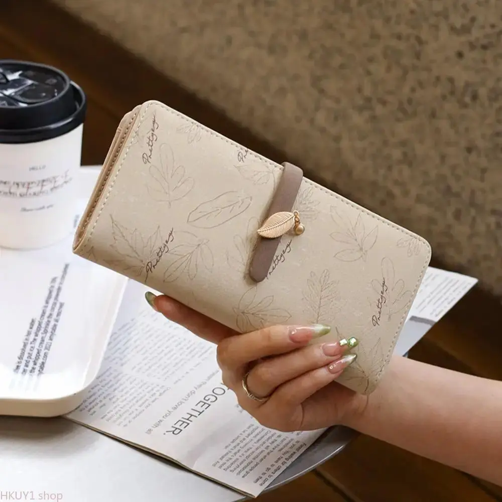 Women's Embossed Botanical Print Clutch Wallet, Soft Synthetic Leather with Multi-Card Slots, Coin Purse, and Leaf Charm Snap