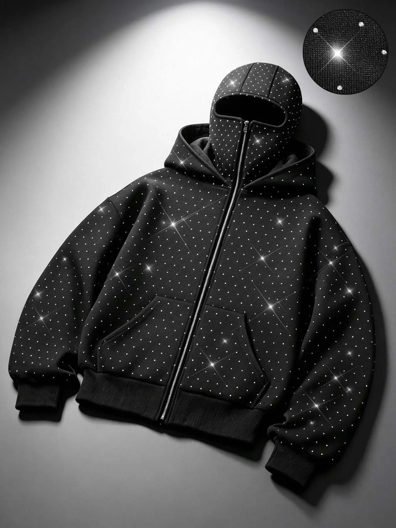 Unisex Y2K-style oversized fleece hoodie featuring an all-over rhinestone finish, a double-layer hood that converts into a balaclava, and a zip-up front—a dark-aesthetic, streetwear-inspired warm jacket.