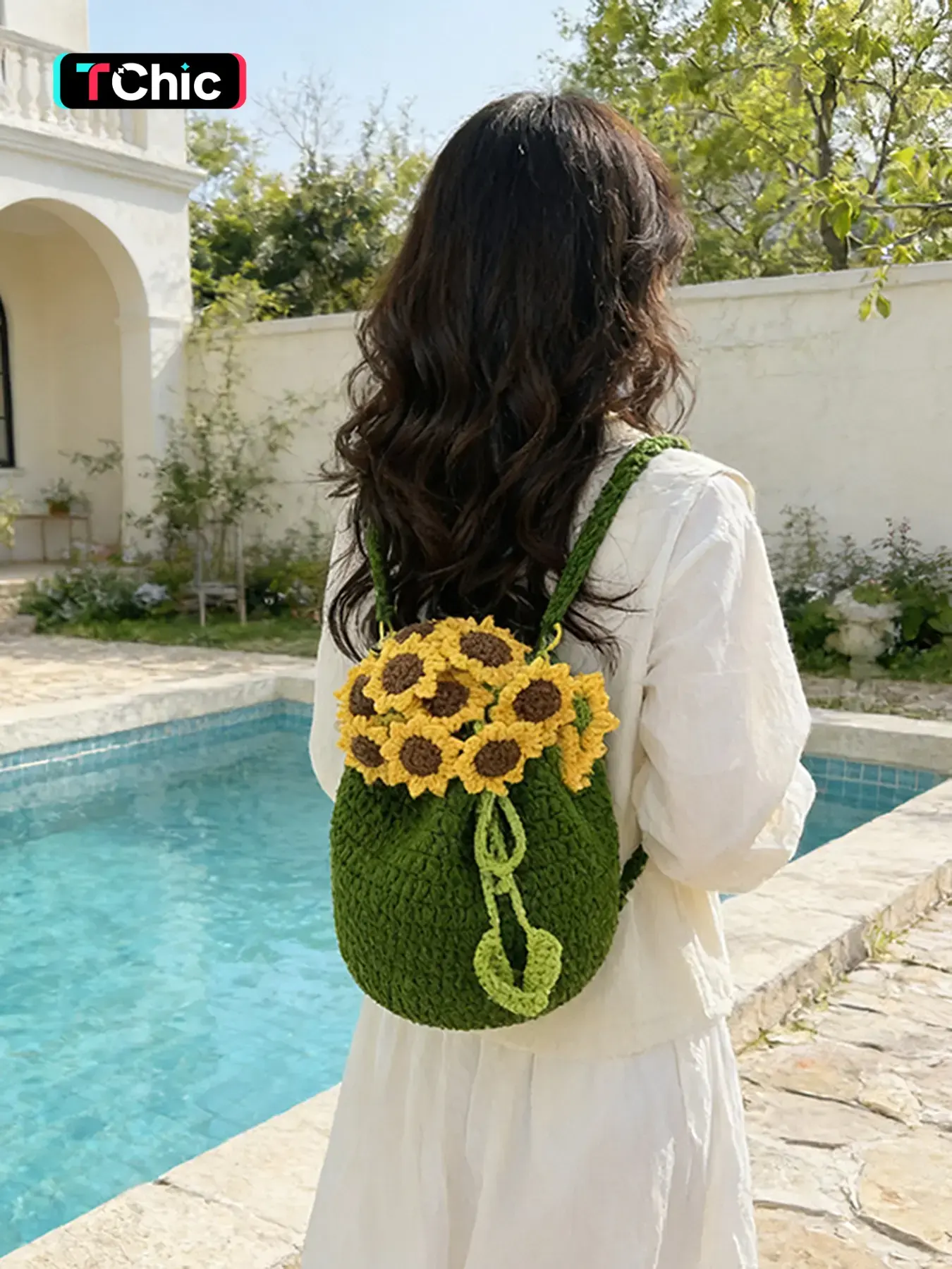 A niche handmade crochet sunflower drawstring backpack, made with green yarn and a cute flower drawstring design, adjustable shoulder straps, a versatile backpack, Stylish Daypack perfect for daily commuting, parties, and outings.