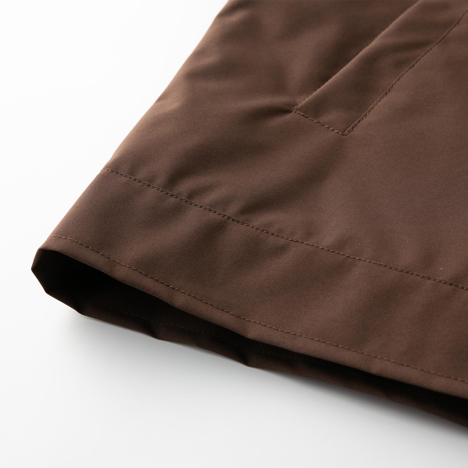 Men’s vintage-style brown work jacket made from durable woven fabric with neat stitching, featuring a classic stand collar and a clean silhouette that enhances a refined look-ideal for dates, office casual wear, and urban strolls.