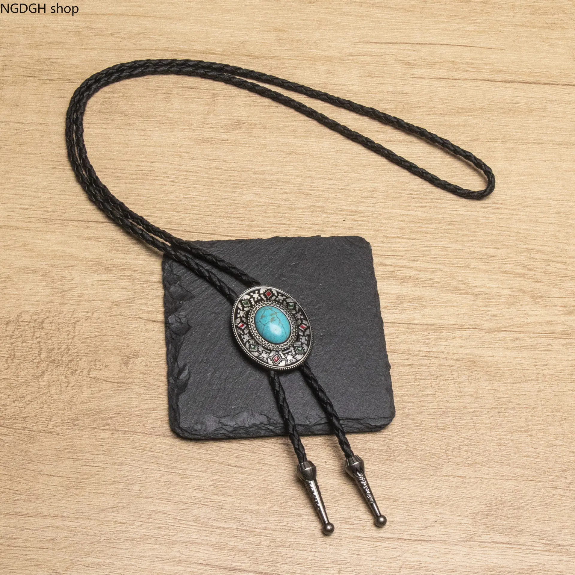Vintage Turquoise Bolo Tie with Black Braided Leather Cord, Western Silver Metal Slide, Retro Cowboy Necktie Accessory, Ethnic Style Jewelry for Men and Women, Perfect for Rodeo, Parties & Classic Western Outfits.