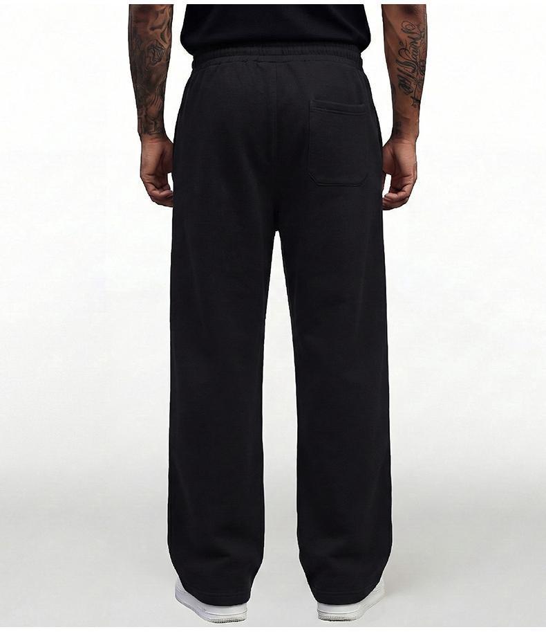 Black loose men’s sweatpants, extremely comfortable for everyday wear, skin-friendly men’s joggers, super comfortable with an elastic waistband, classic drawstring men’s casual sweatpants, suitable for various occasions, and perfect for wearing in spring