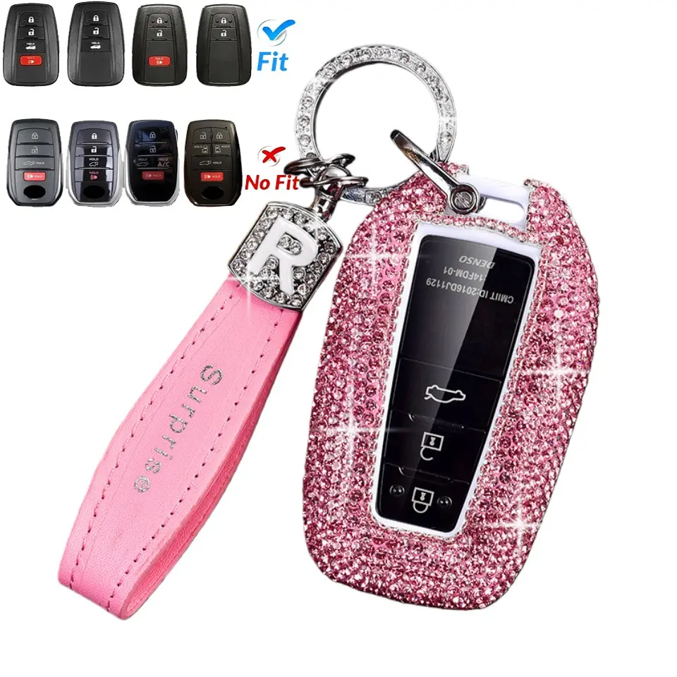 Luxury-sleek lady's diamond-encrusted car key case, made by hand from genuine leather, with R brand glittering diamond hanging string decoration. Suitable for Toyota Corolla, Camry, RAV4, Land Cruiser, Honda RAV4, and Lexus. Key Fob Cover