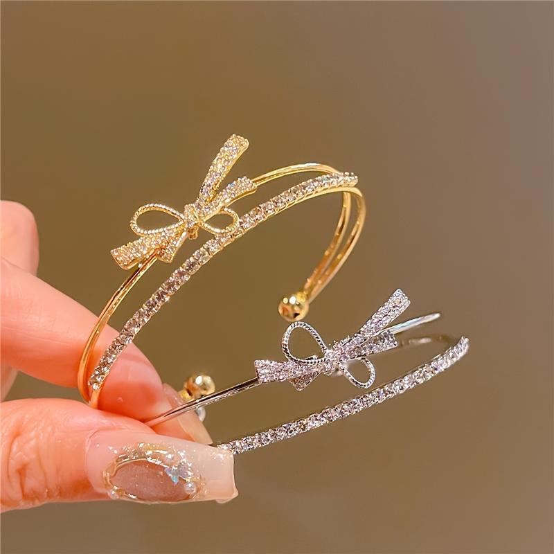 Elegant Gold Bow Bracelet with Synthetic Cubic Zirconia Inlay, Women's Open Design Bracelet for Casual and Special Occasions