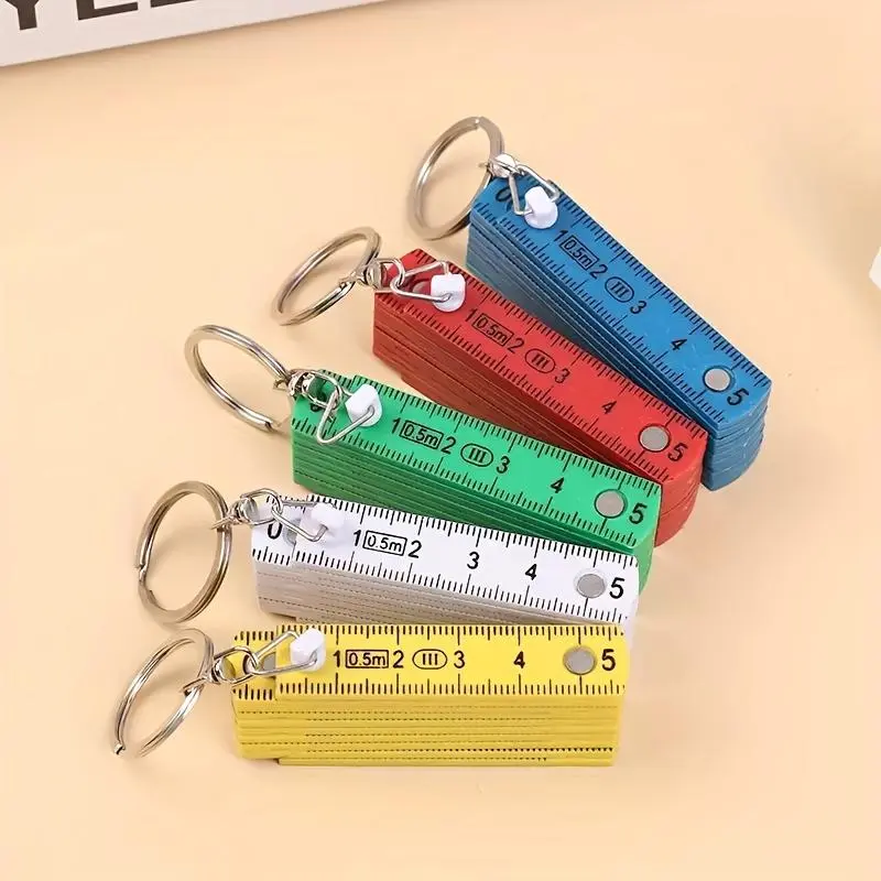 1pc Multifunctional ABS Plastic Folding Ruler, 50cm/19.69in, 10-Fold with Keychain, Compact and Portable, Multi-Purpose Folding Ruler Drawing Tool, Student Measuring Ruler