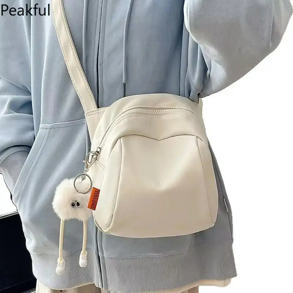 Lightweight Large Capacity Nylon Crossbody Bag for Women, Spacious Shoulder Purse with Adjustable Strap & Fluffy Charm, Durable Travel & Daily Shoulder Handbag