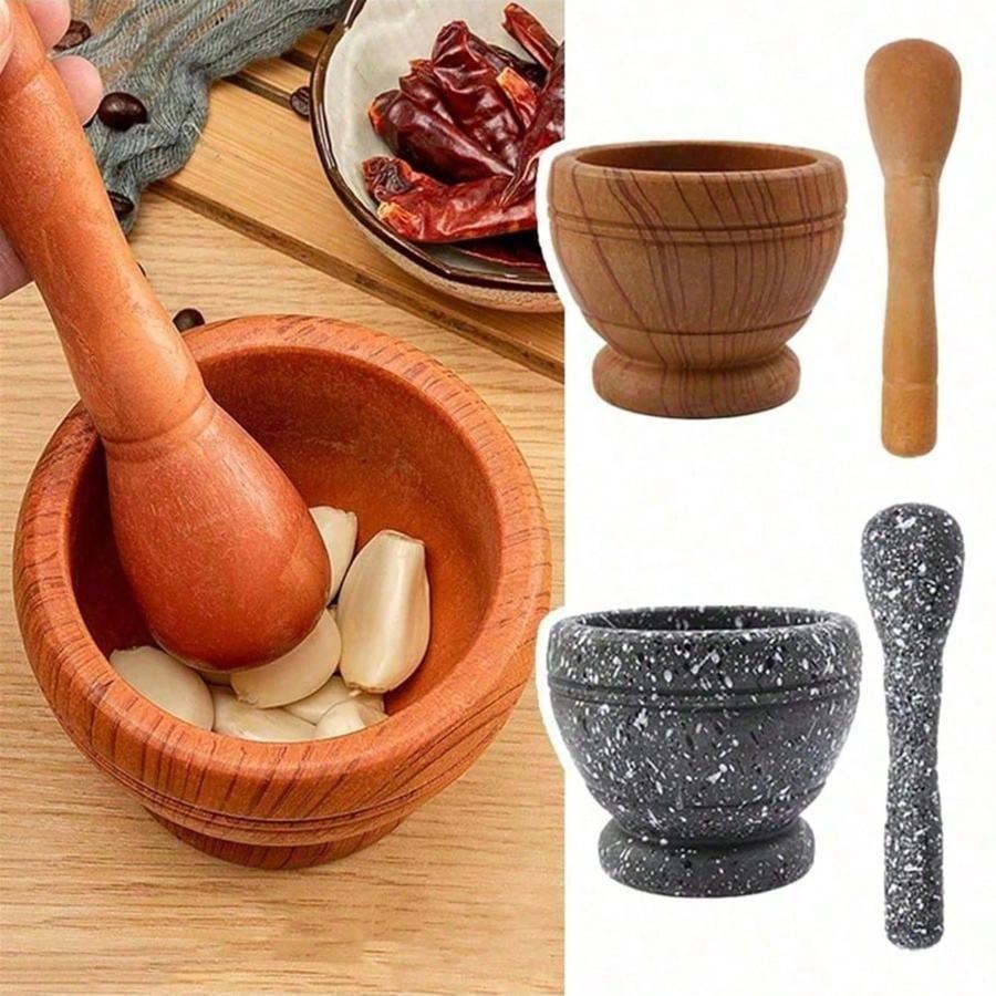 A practical garlic grinder with a mortar, a multi-functional manual food grinder, a kitchen crushing tool, a household garlic grinder, and a spice tool