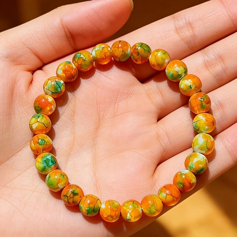 [Rain Flower Stone Bracelet] A Smooth Orange-Yellow Rain Flower Stone Bracelet That Attracts Wealth, Handcrafted And Elastic, Symbolizes Fortune And Luck, Suitable for Both Men And Women, Perfect for Everyday Wear And As a Gift