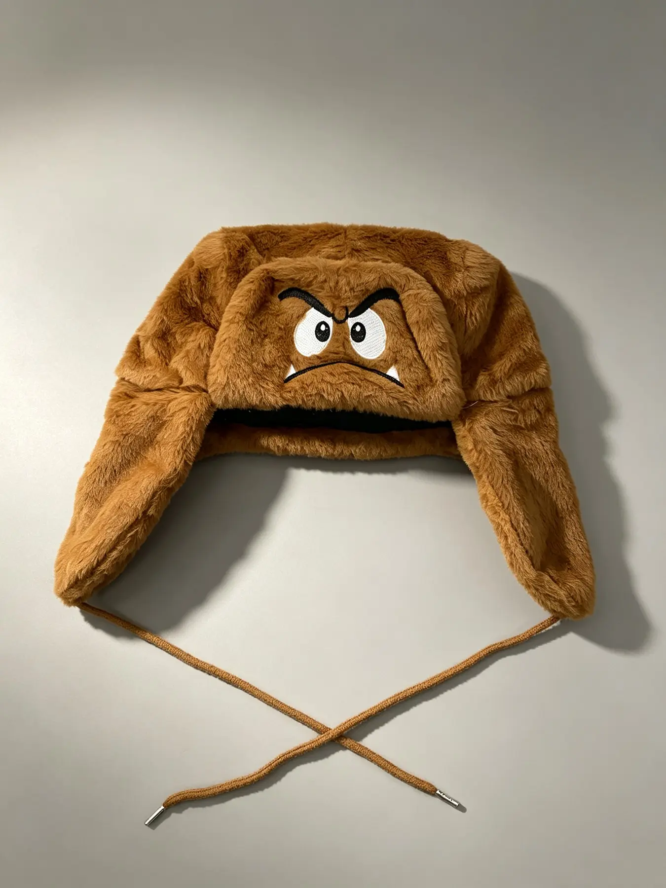 Angry cartoon monster embroidered hat Embroidery Adjustable Hat plush earmuff hat drawstring windproof neutral warm hat