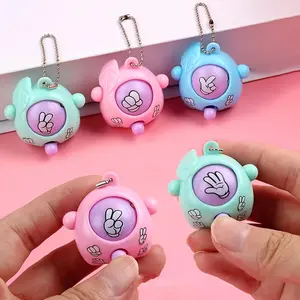 Gift for her/him 12-piece set: Mini fun finger riddle game toy, Tic-Tac-Toe "Riddle Egg" keychainPerfect for Halloween and Christmas gifts, children's rewards, and birthday party favors for boys and girls (various colors available)