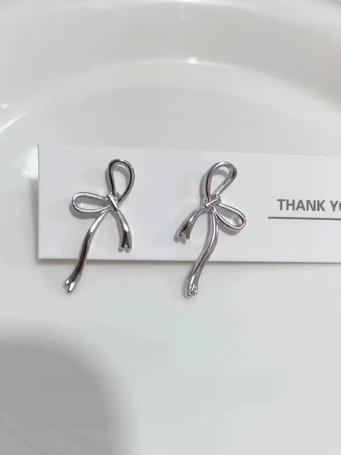 Minimalist Silver Color Bow Stud Earrings for Women, Unique Hollow Design, Elegant All-Season Jewelry, Versatile Commute Ear Accessories