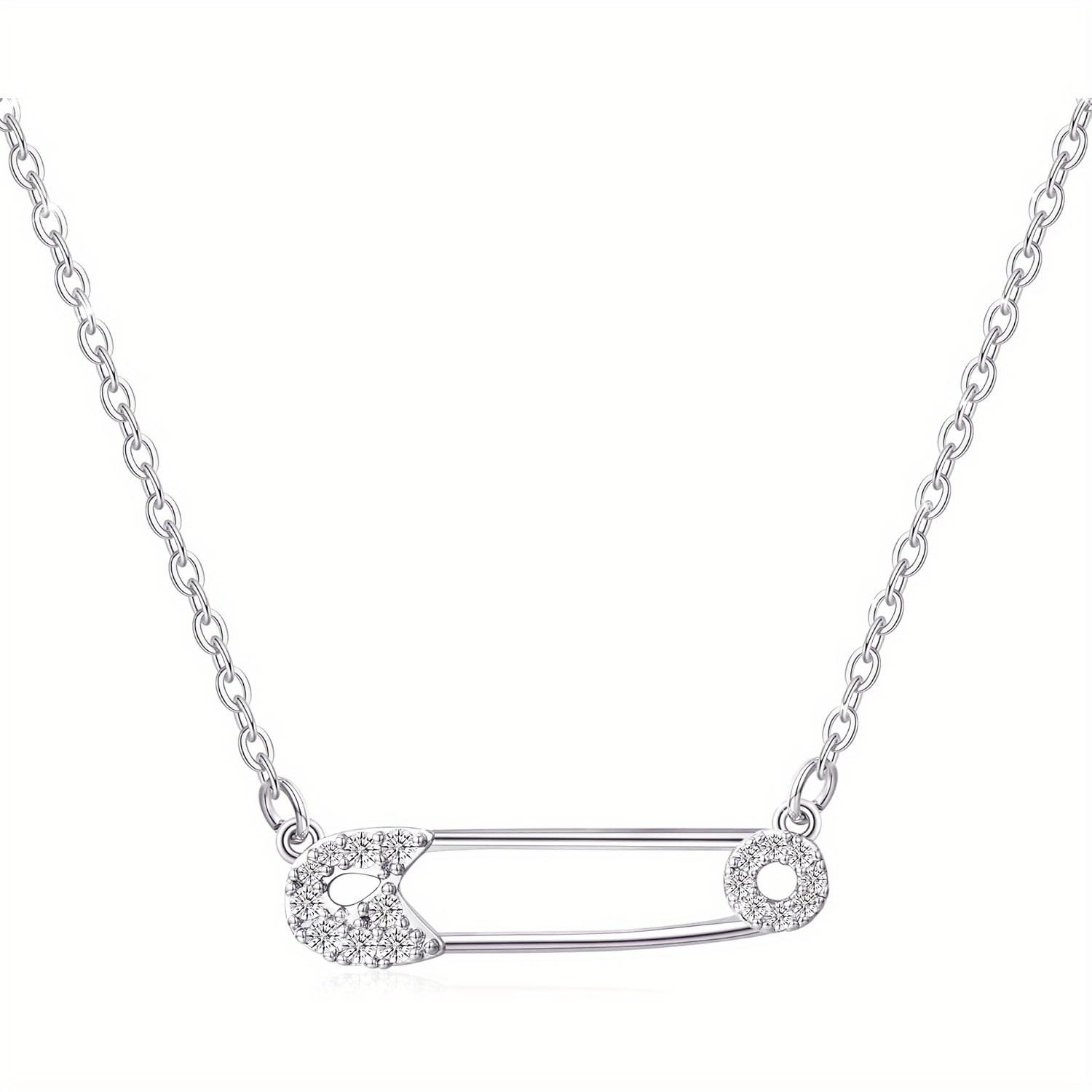 A Stylish Necklace Collar for Women Featuring Safety Pins niki safety pin necklace